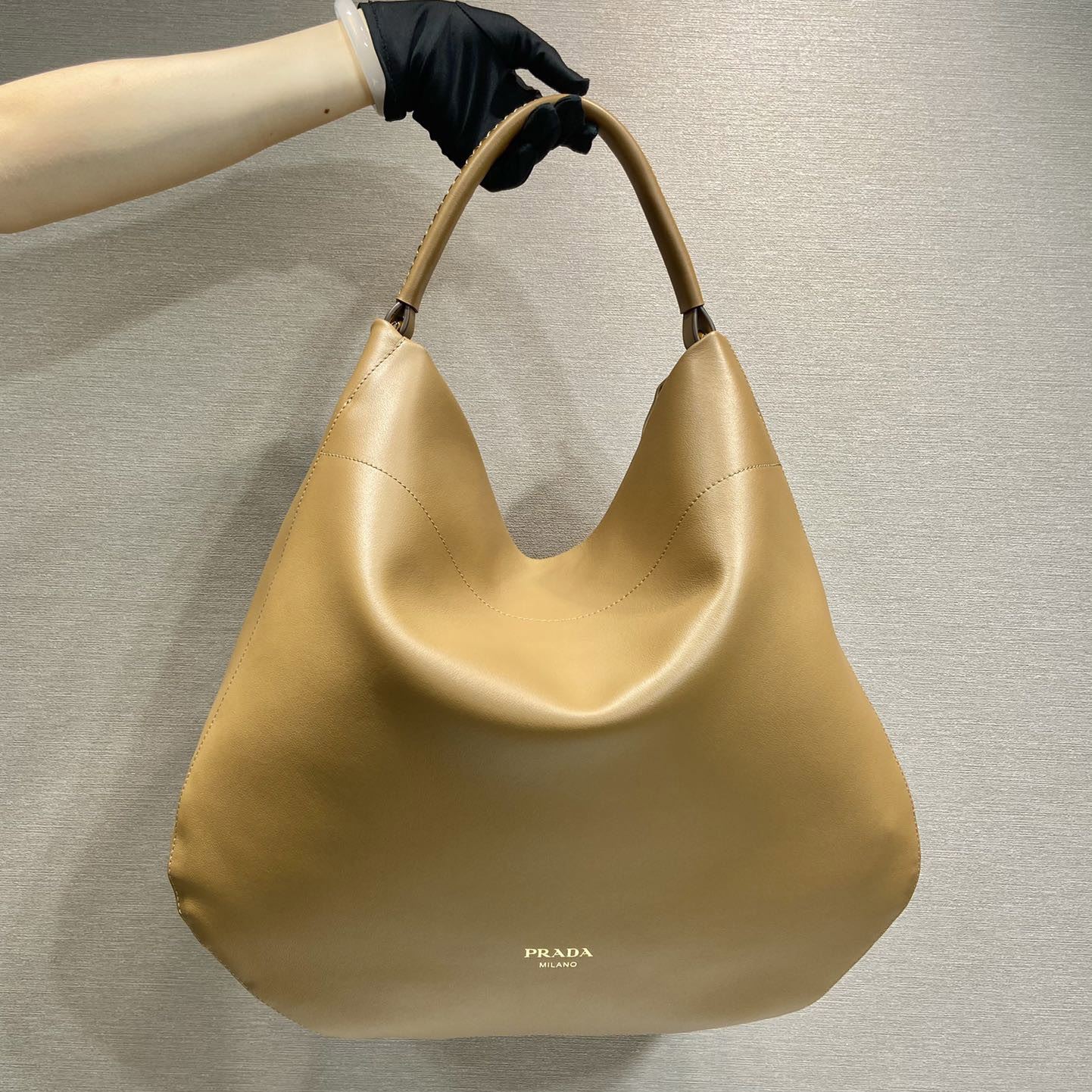 Pra*a top handle bags
